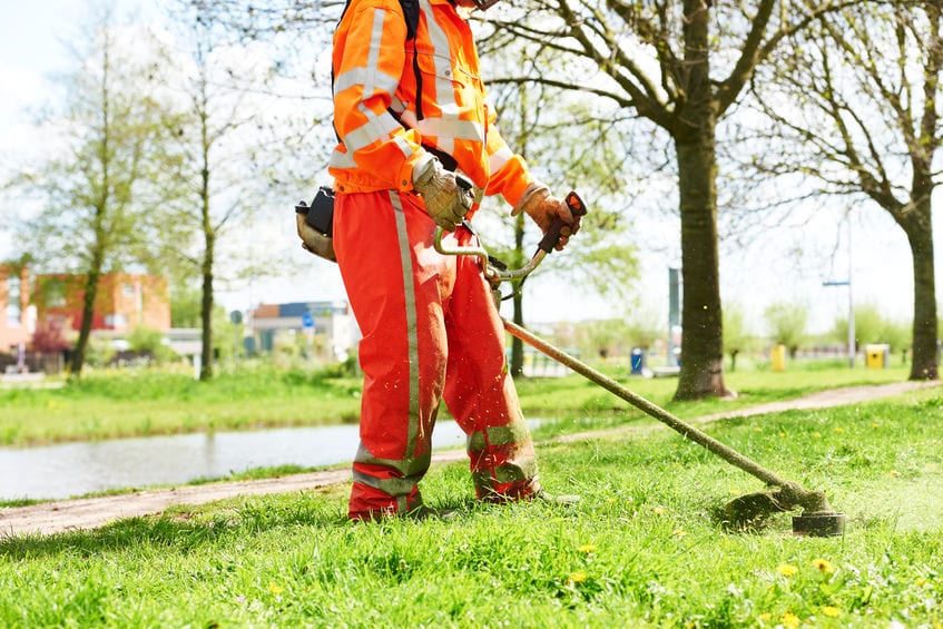 lawn mower worker man cutting grass